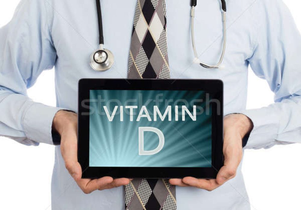 7246200_stock-photo-doctor-holding-tablet-vitamin-d